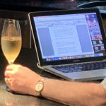 drinking Champagne in front of the computer