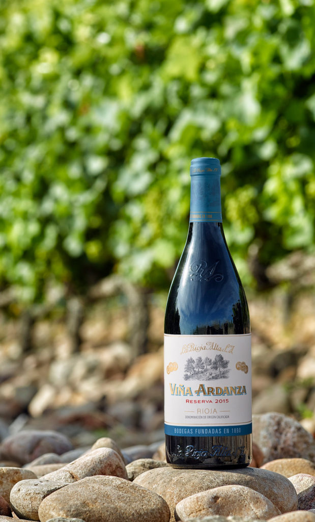 wine bottle in a vineyard