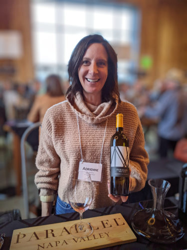 Photo of Adrienne D.A. Smith, General Manager/Partner with 2019 Parallel Napa Valley Cabernet Sauvignon