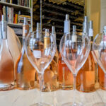 Rosé wine in clear glass bottles