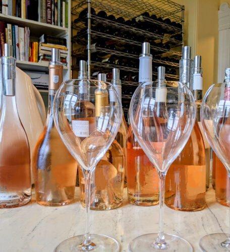 Rosé wine in clear glass bottles